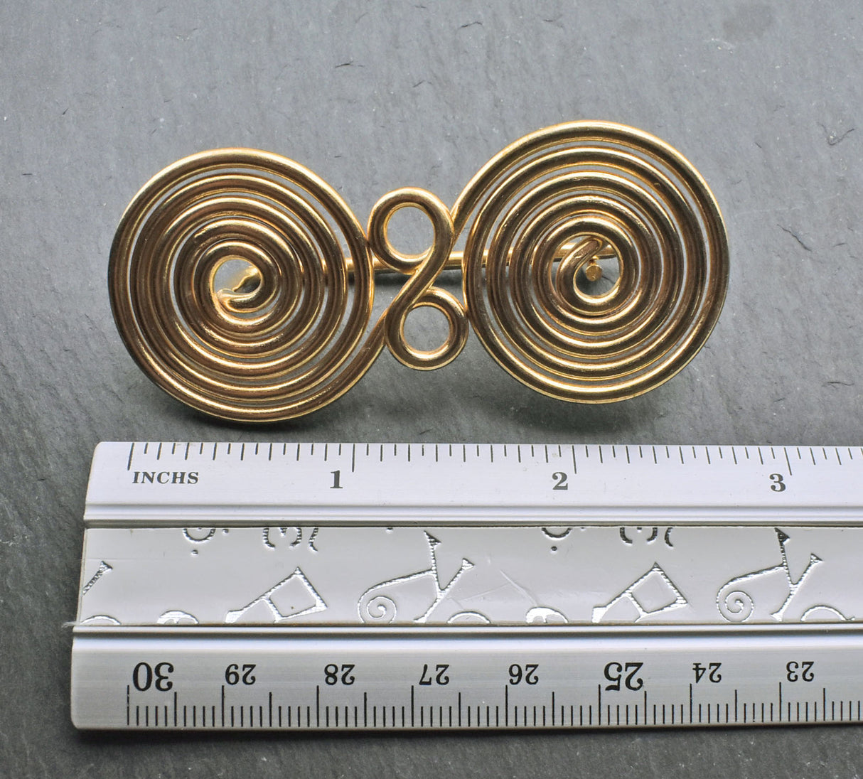 Maße in inch der Hallstatt Spiralfibel aus Messingdraht