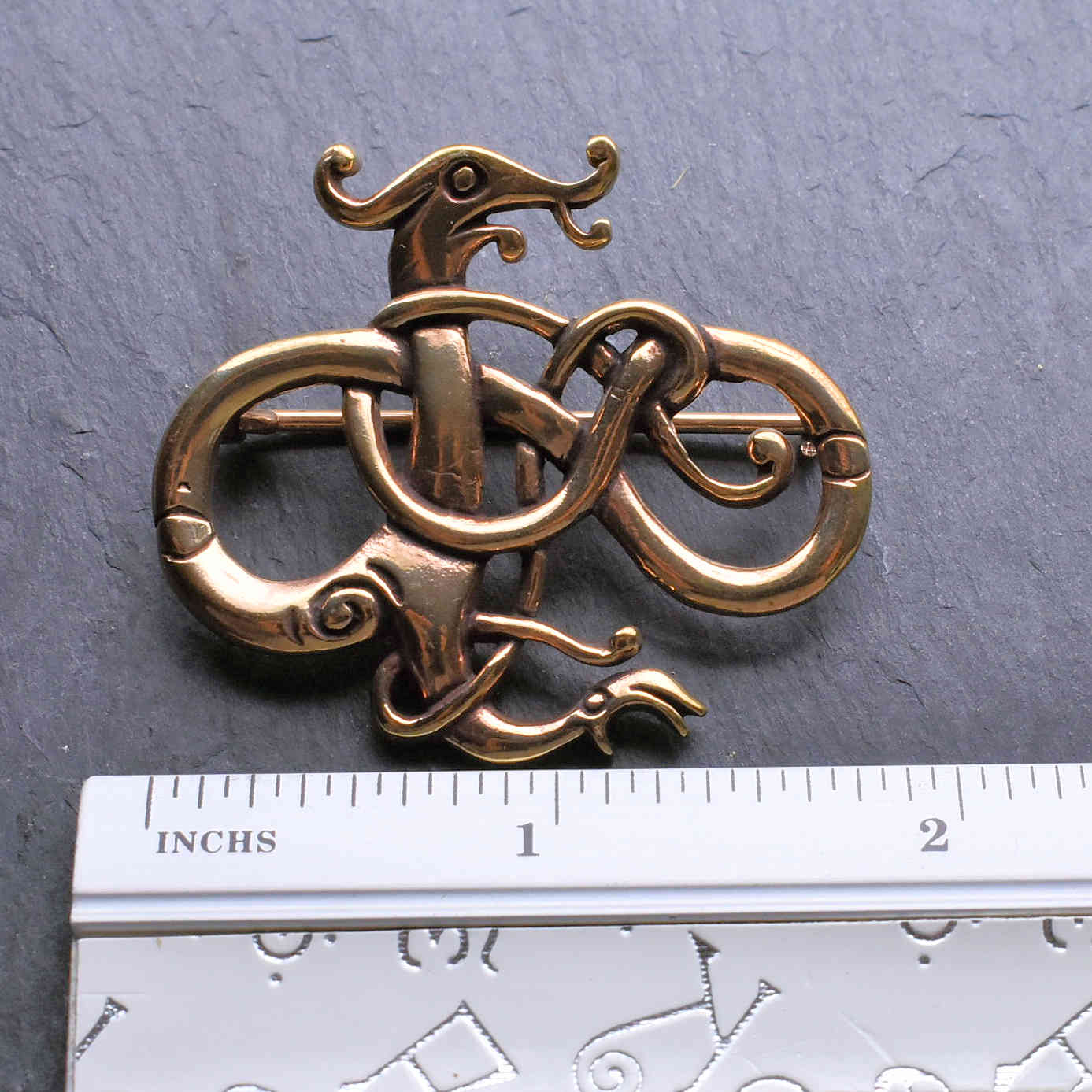 Dimensions of the bronze Viking dragon brooch in Urnes style in inches