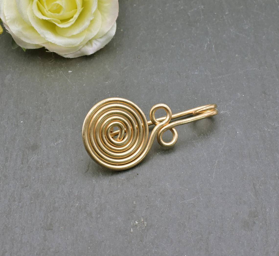 Bronzezeitliche Spiralfibel aus Bronze