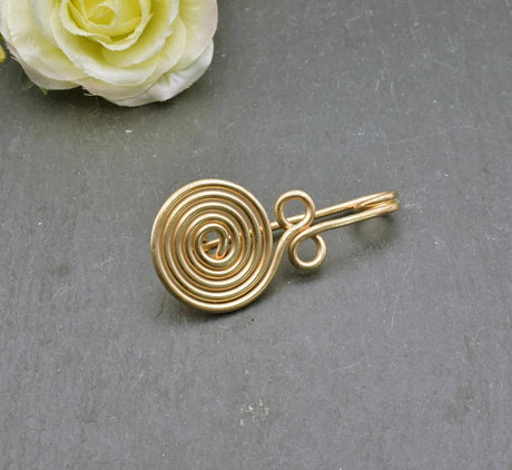 Bronzezeitliche Spiralfibel aus Bronze