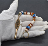 Birka Ohrlöffel aus Bronze – Wikinger Hygiene & Replik mit Knochenperlen, Bernstein und blauen Glasperlen