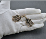 Gewandschließe Hugin und Munin aus Bronze mit zwei Raben. Zweiteiliger Mantelverschluss zum Annähen für Wikinger-Gewandung und Reenactment.
