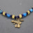 Fibelkette für Mutige mit antikem Phallus-Anhänger – Glasperlen in blau und gelb - Anhänger 