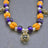 Wikinger Fibelkette Gotland in Orange und blau