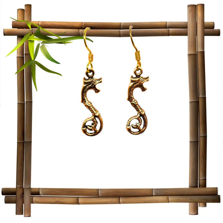 Keltische drachen-ohrringe aus bronze - ohrringe