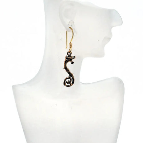 Keltische drachen-ohrringe aus bronze - ohrringe