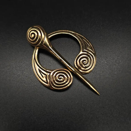 Keltische ringfibel aus bronze mit spiralen - penannular