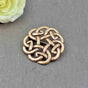 Keltische rundfibel aus bronze mit flechtknoten - brosche