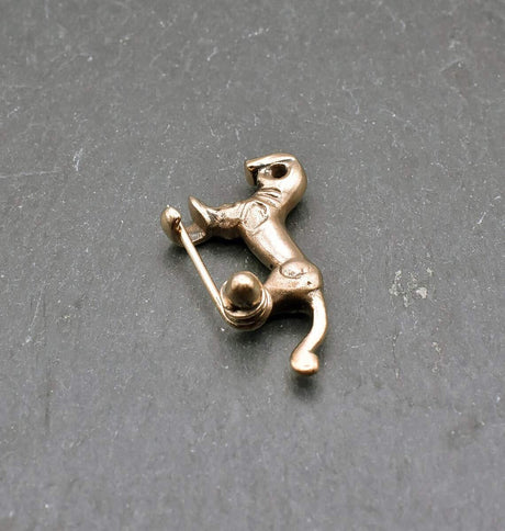Kleine keltische pferdchenfibel aus bronze - fibel